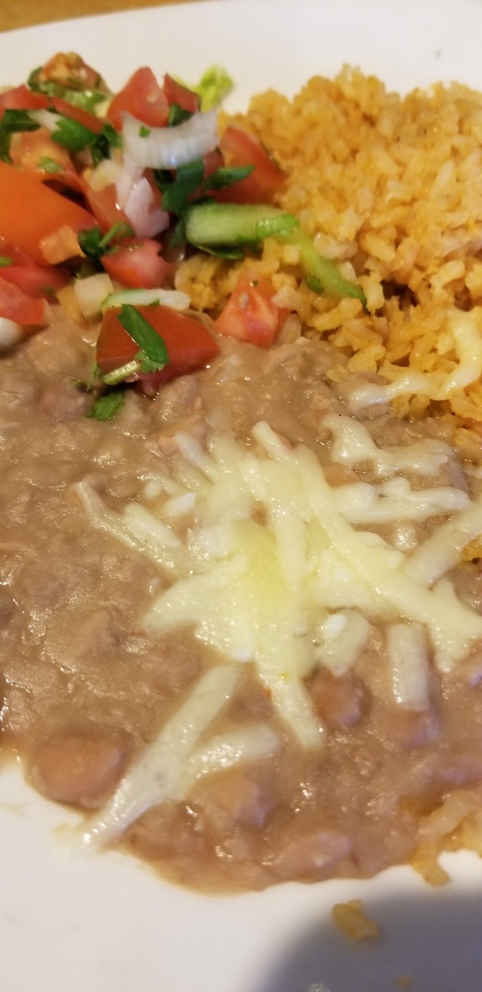 Printed menu with burritos and quesadillas