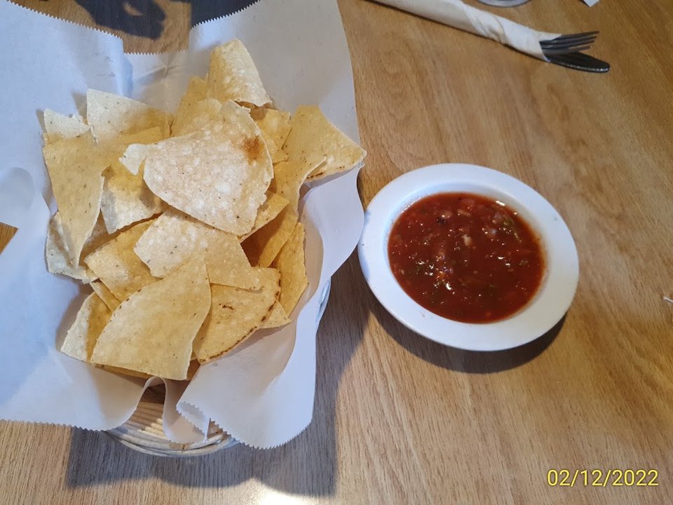 Printed menu with burritos and quesadillas