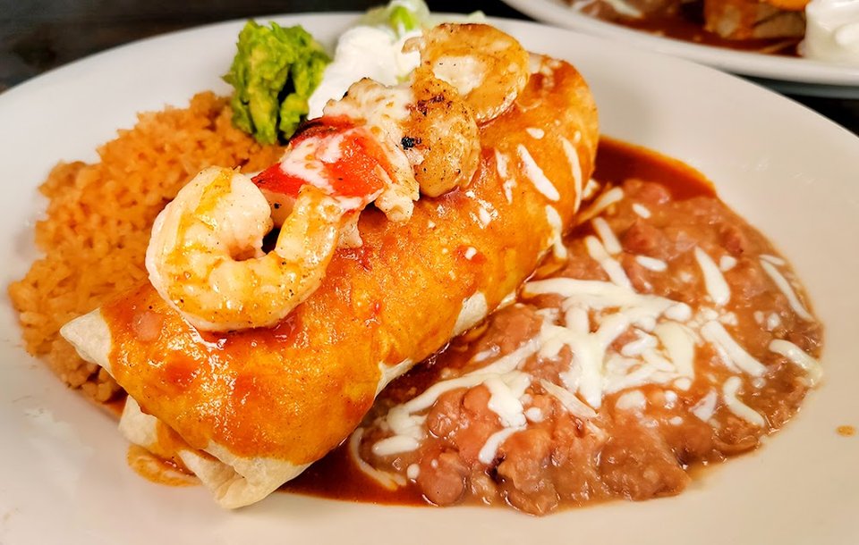 Mexican menu board with steak and seafood